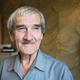 In this August 27, 2015 photo former Soviet missile defense forces officer Stanislav Petrov poses for a photo at his home in Fryazino, Moscow region, Russia. (AP Photo/Pavel Golovkin)